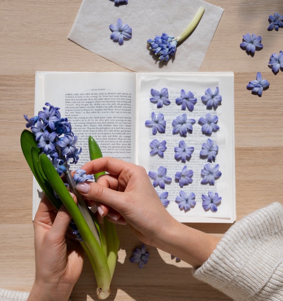 view female artisan pressing flowers.jpeg